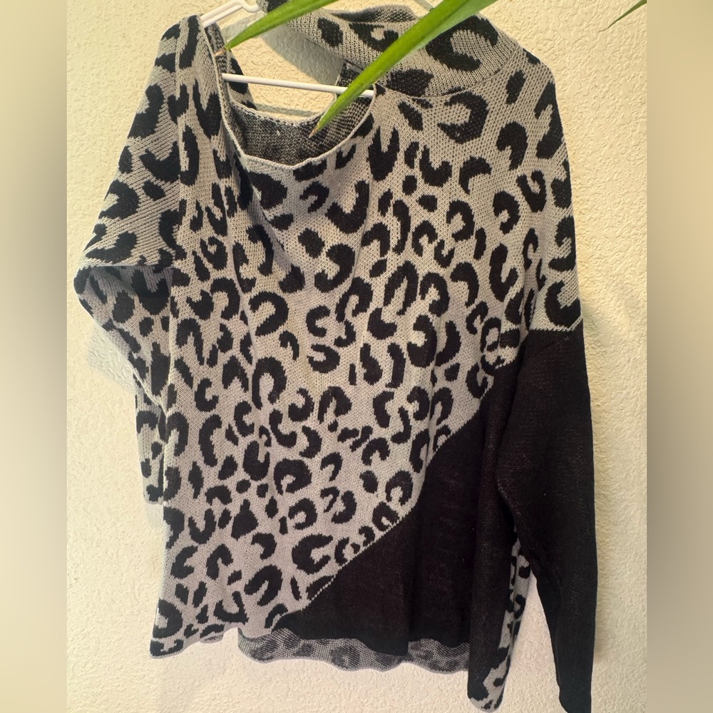 Peek shoulder cheetah print sweater